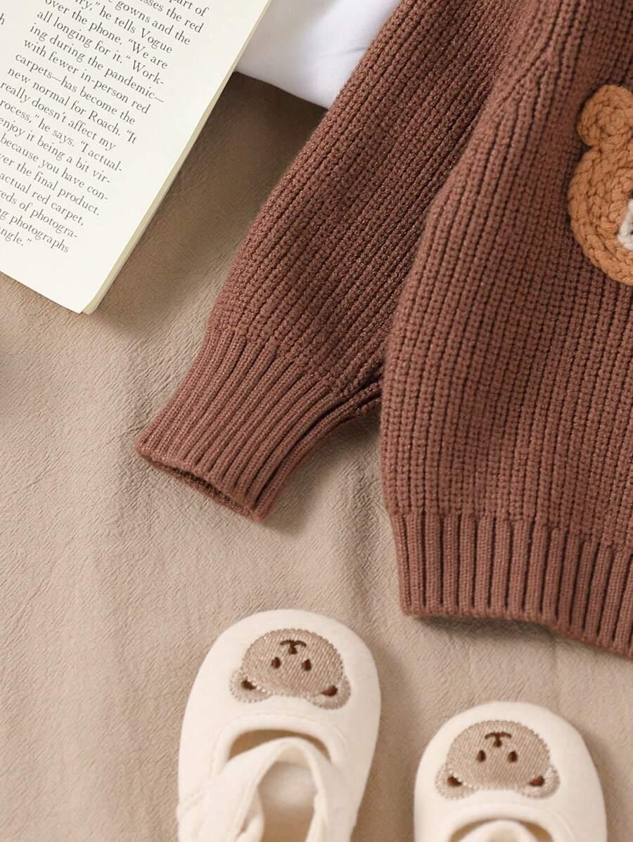 brązowy sweter okrągły dekolt