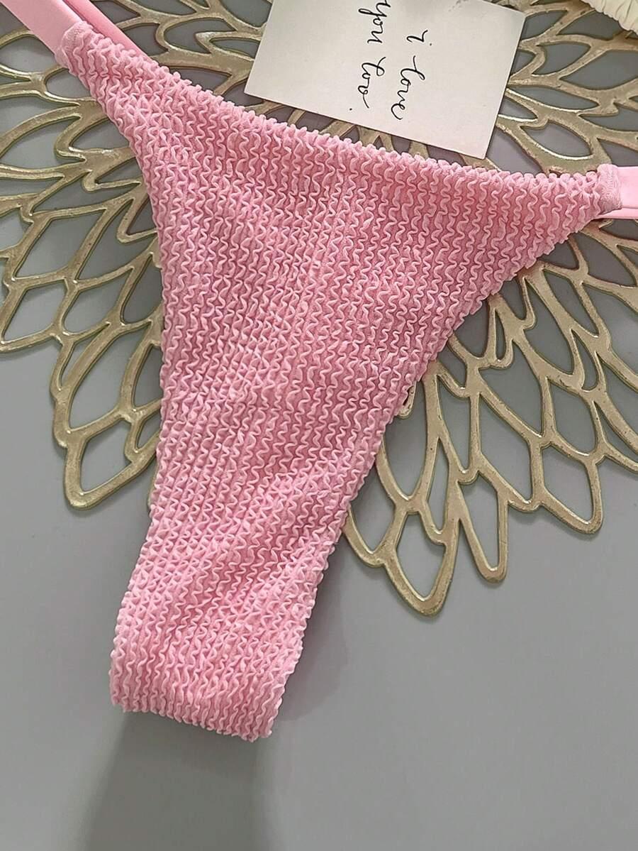 różowy dół od bikini