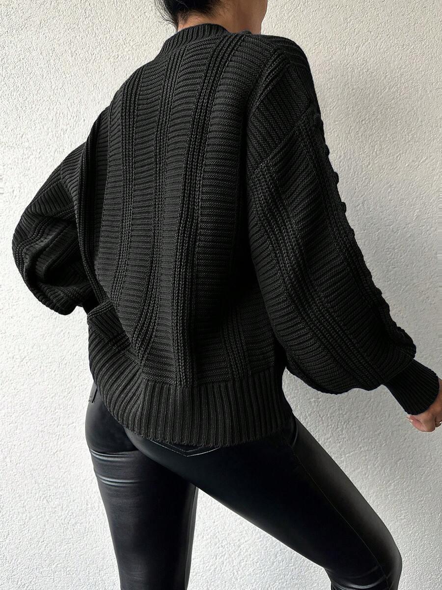 czarny sweter guziki