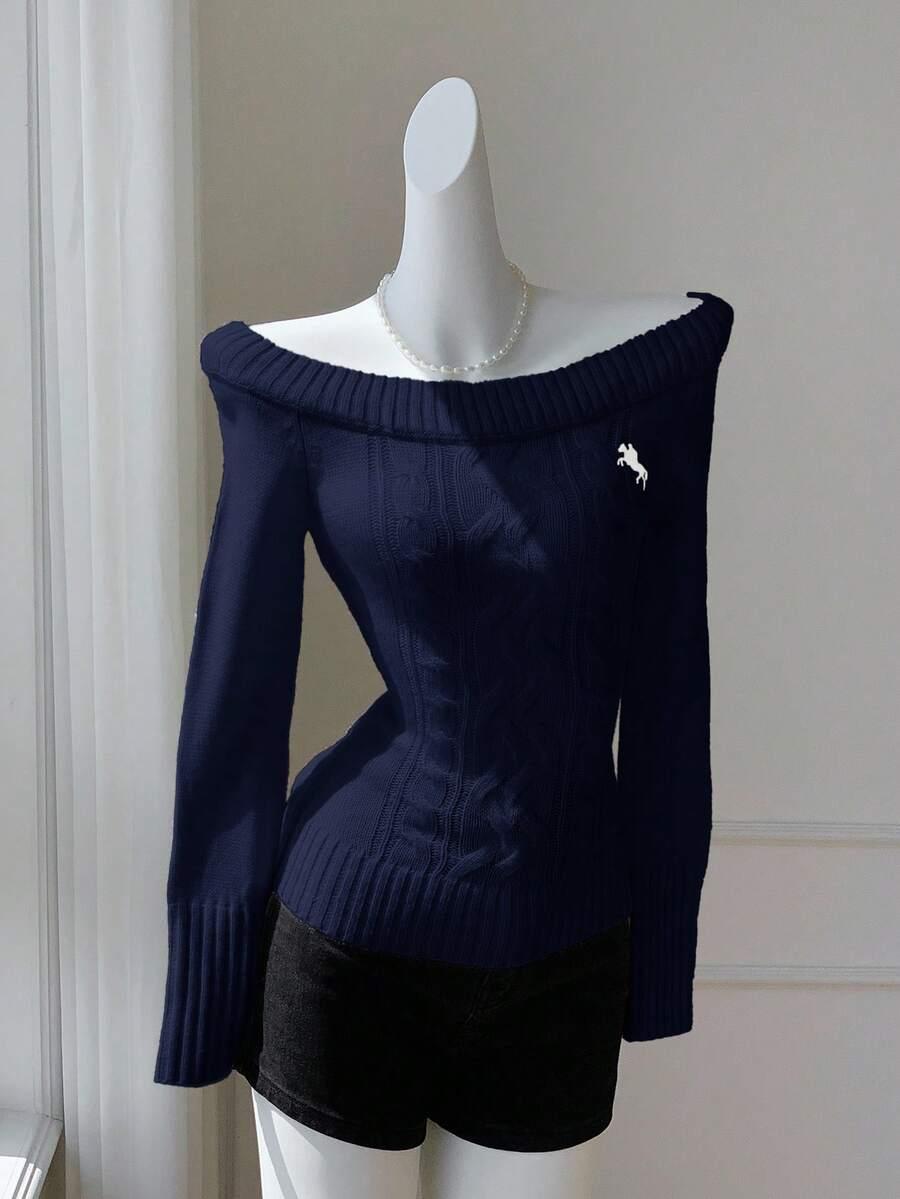 niebieski dzianinowy sweter