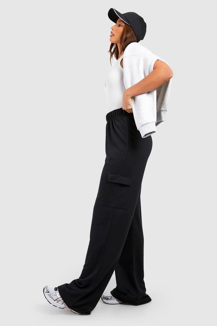czarne szerokie spodnie dresowe kieszenie