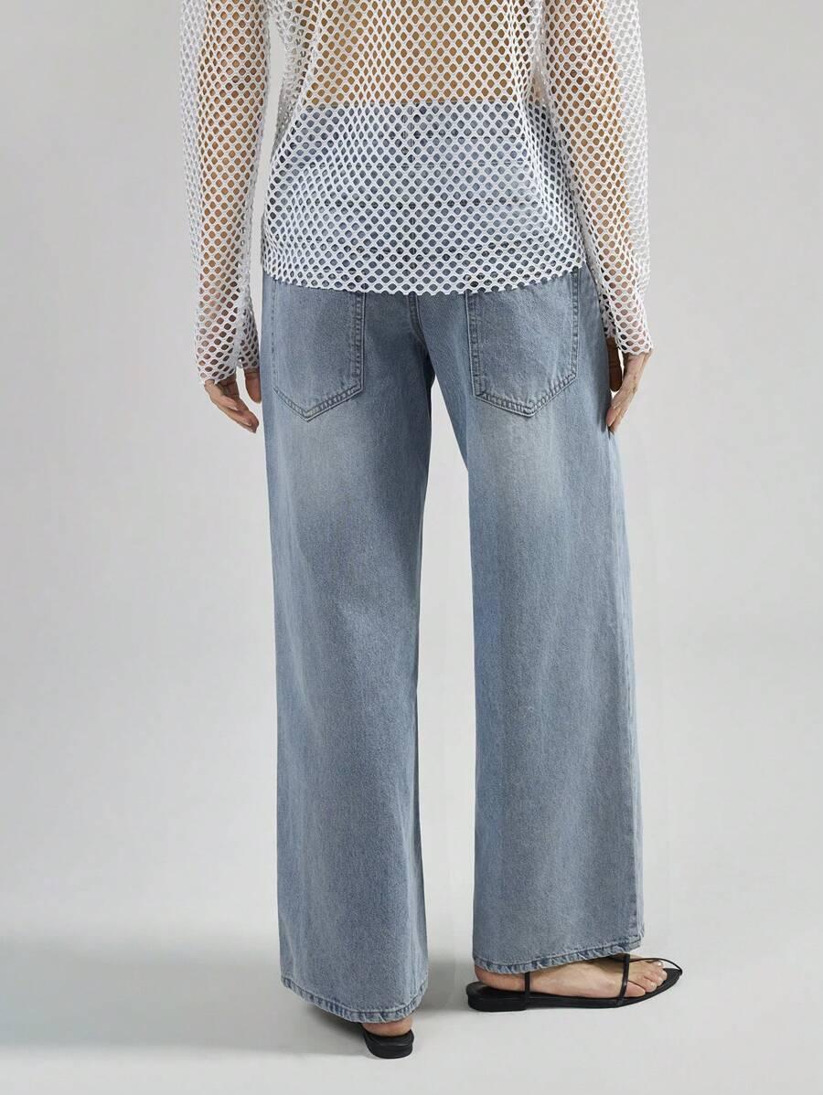 SPODNIE JEANS ASYMETRIA