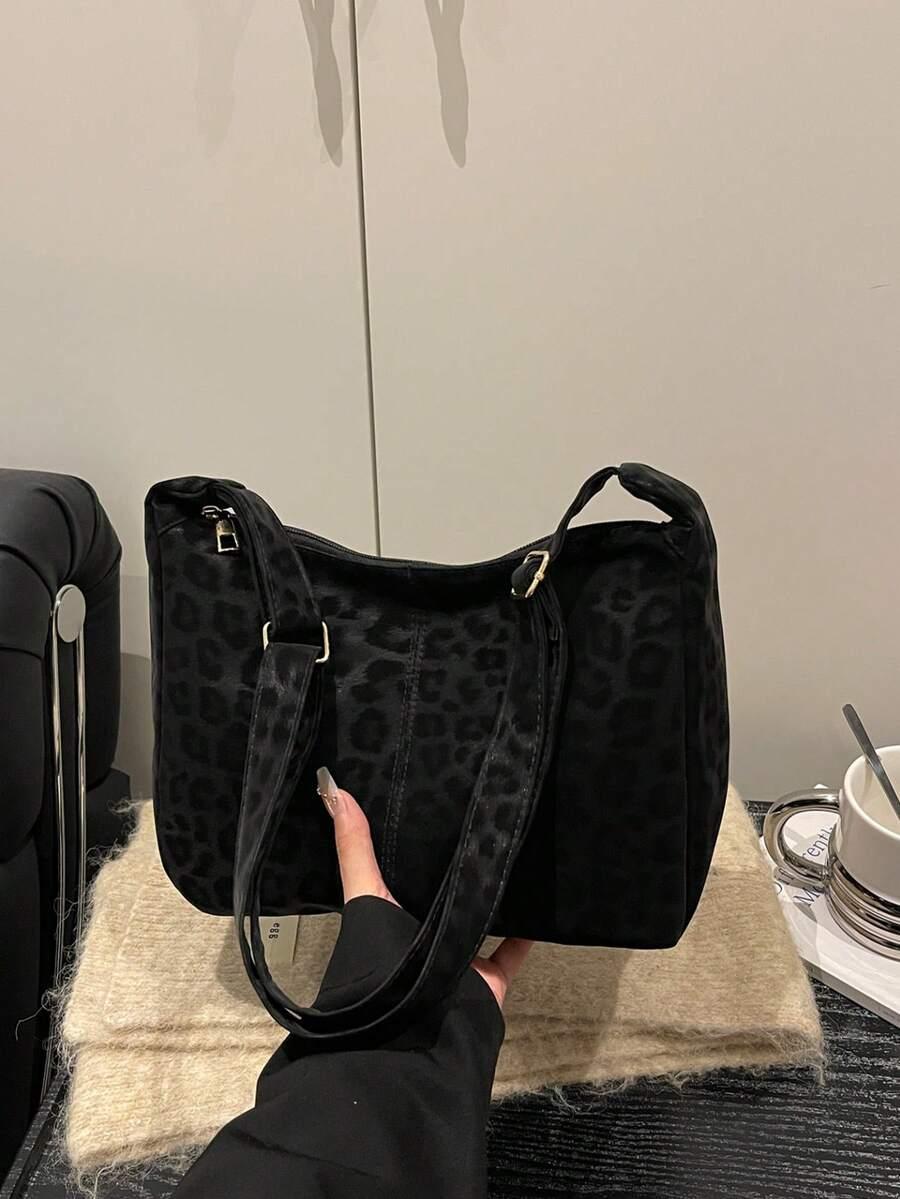 czarna torebka animal print
