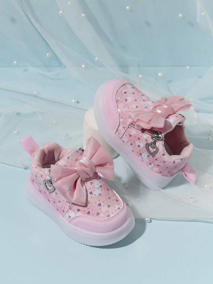 różowe święcące buty
