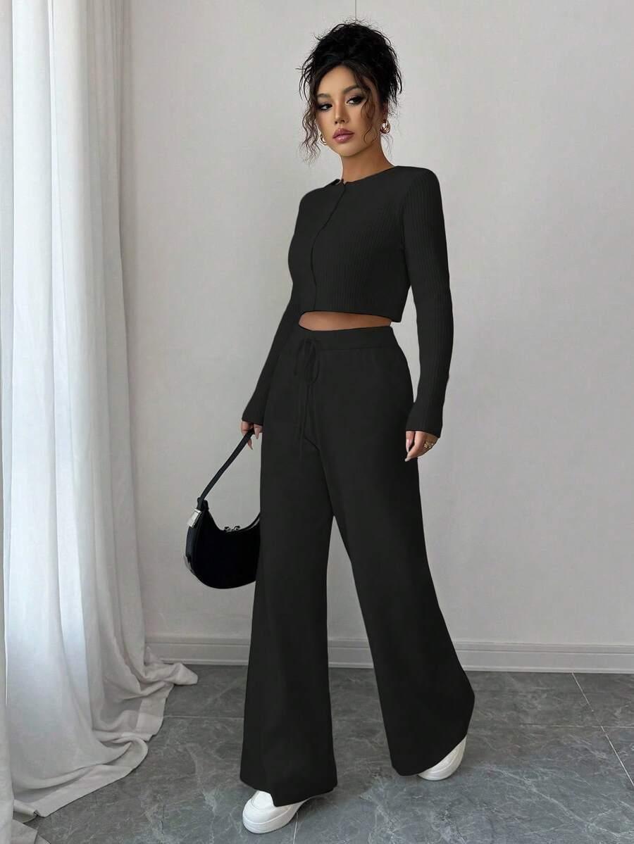 czarny dzianinowy sweter guziki 