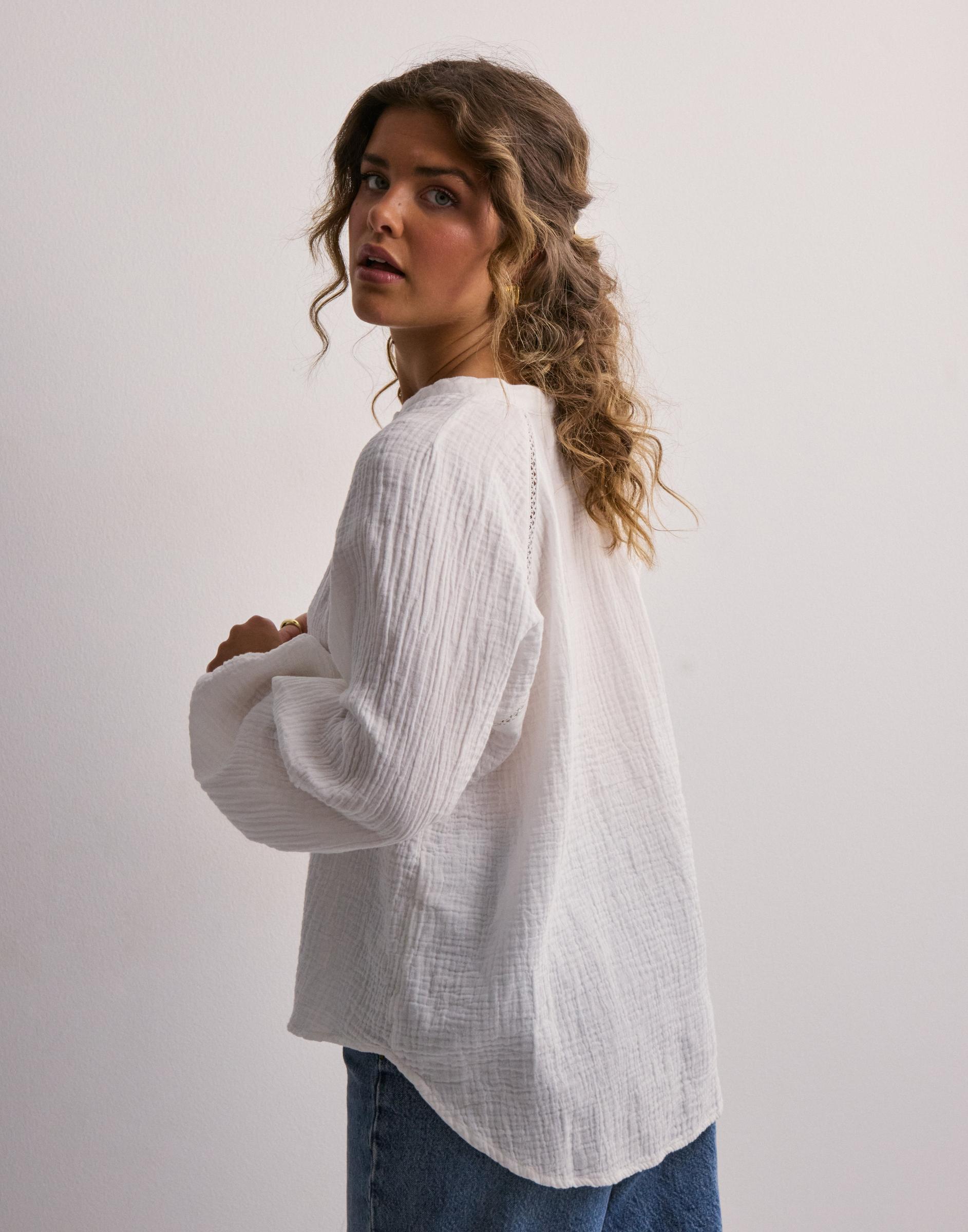MUŚLINOWA LUŹNA BIAŁA BLUZKA V-NECK