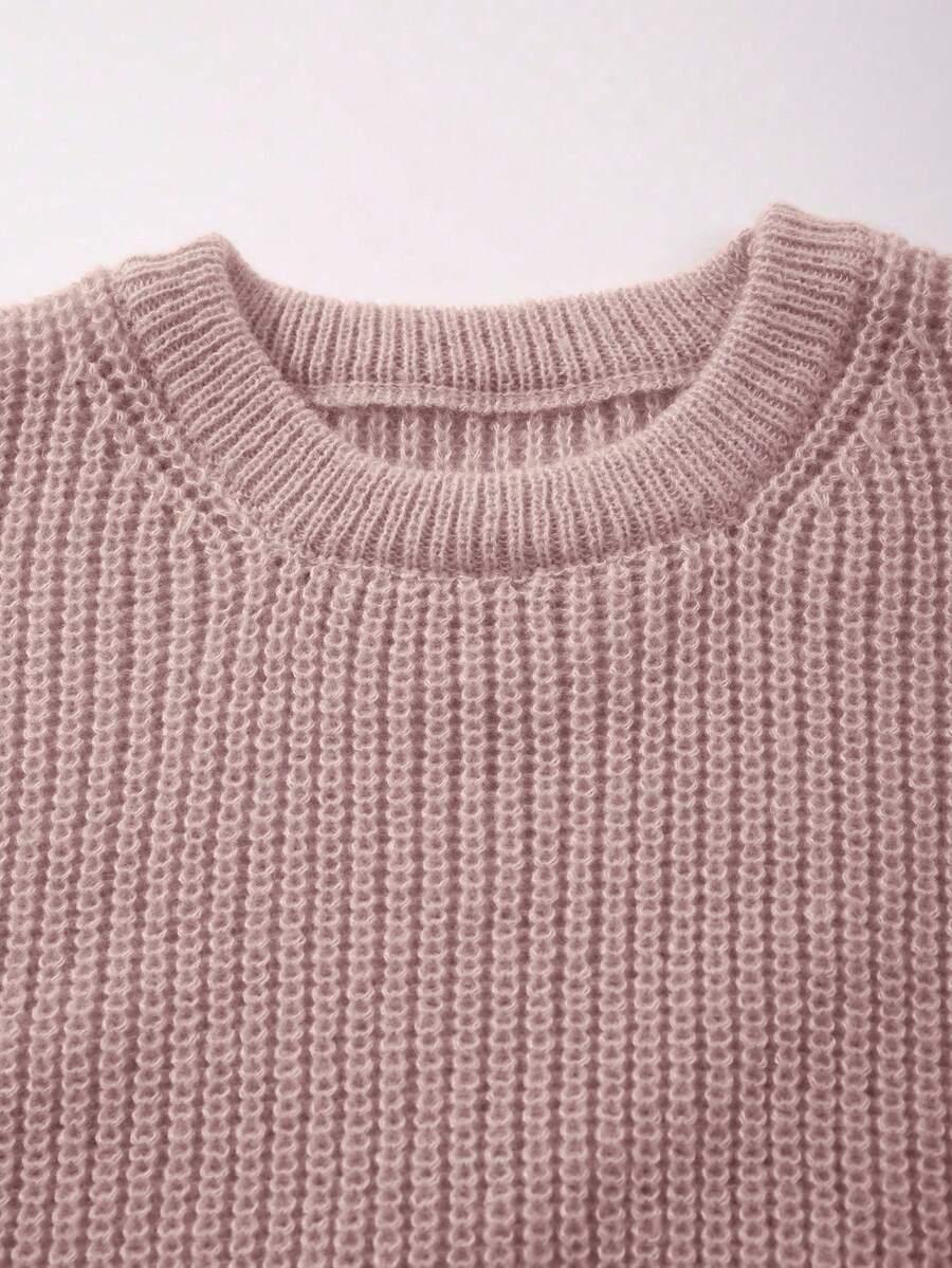 różowy sweter długi rękaw