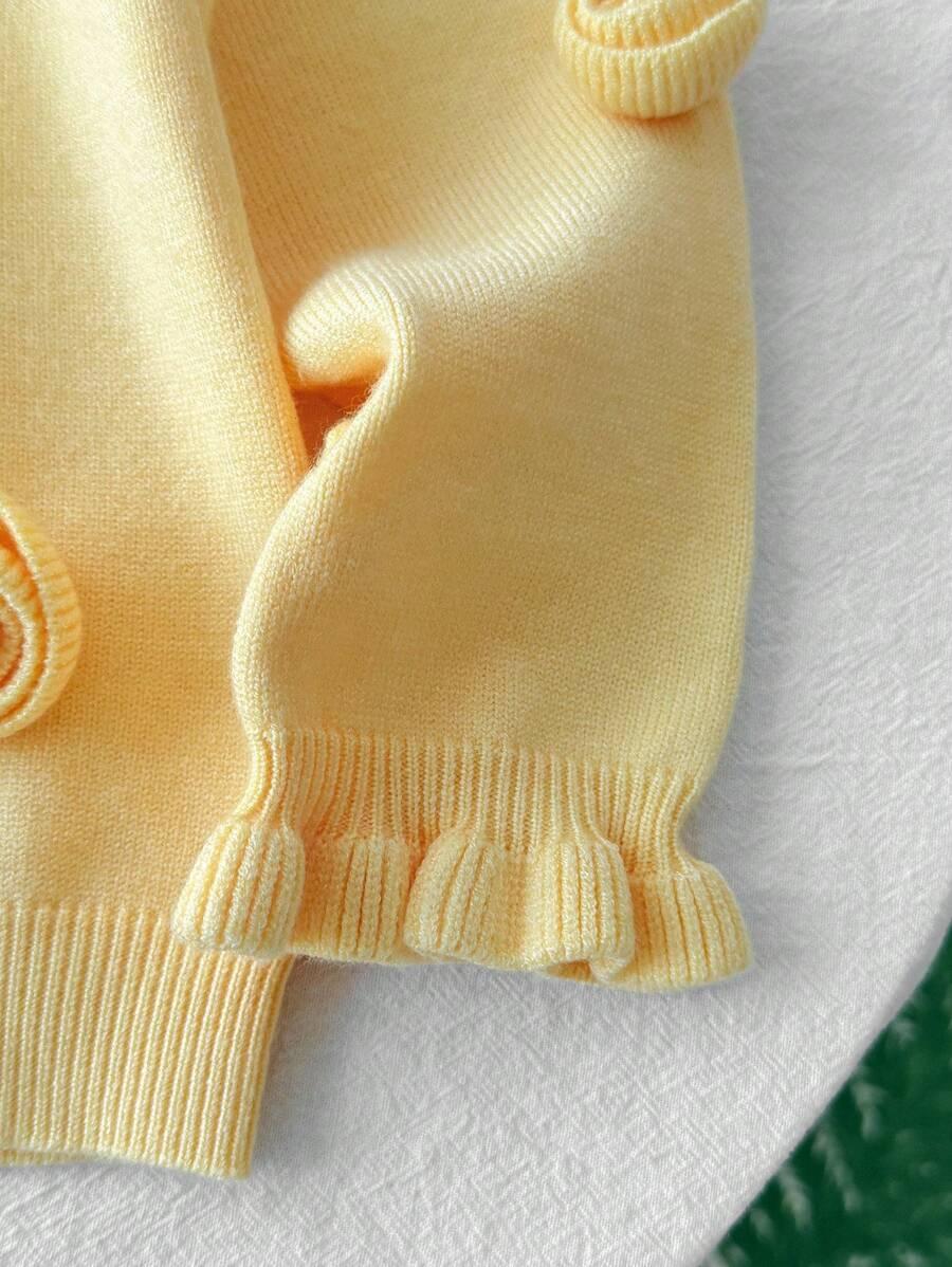 żółty sweter kwiaty