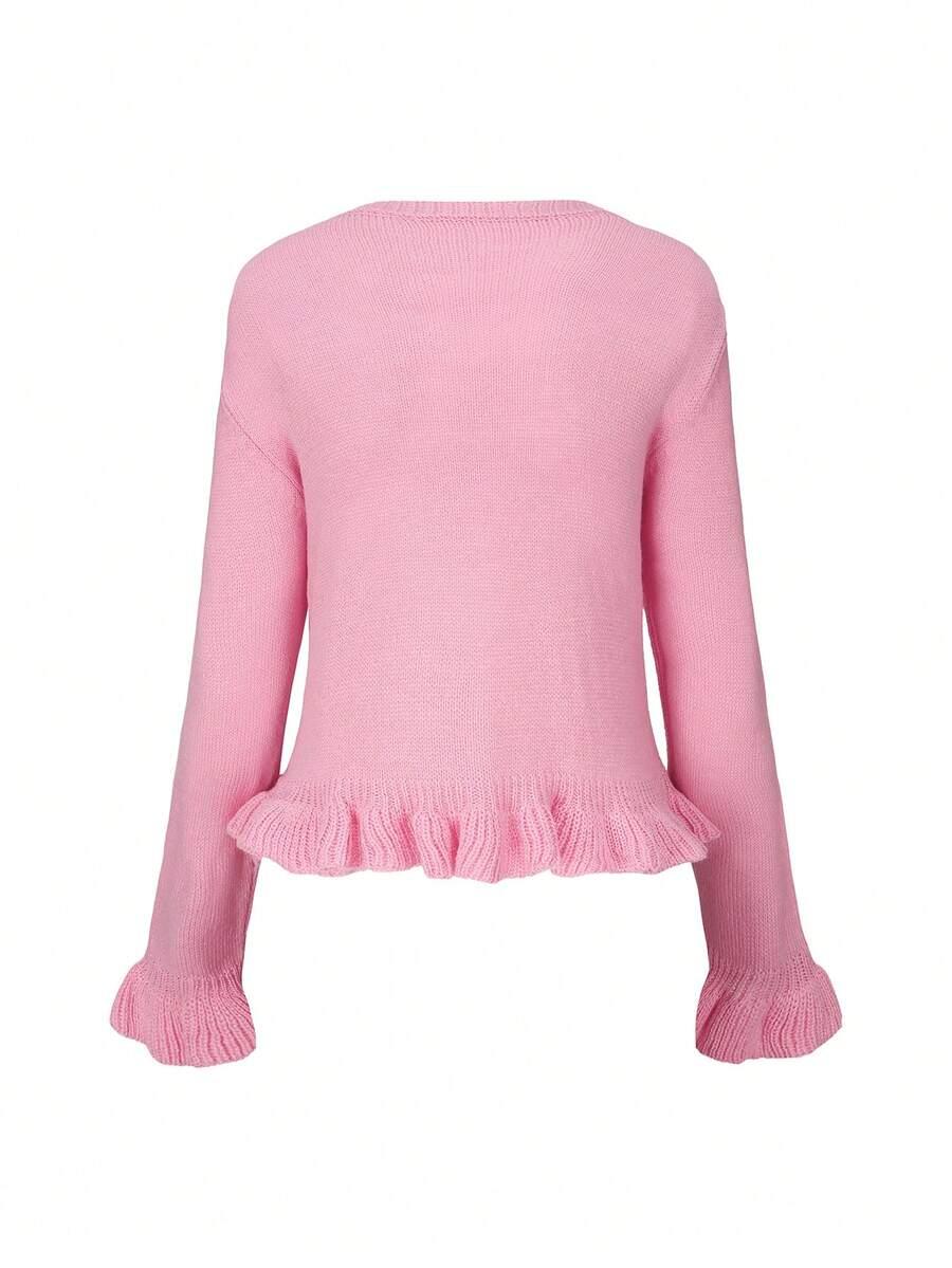 RÓŻOWY SWETER GUZIKI