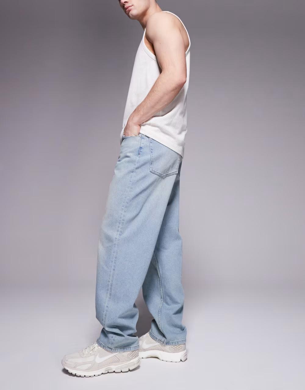 niebieskie spodnie jeans zamek