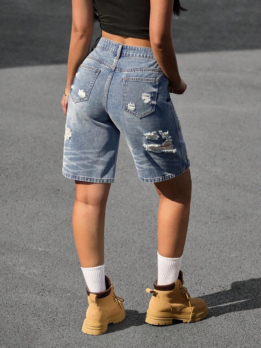 niebieskie spodenki jeans przetarcia