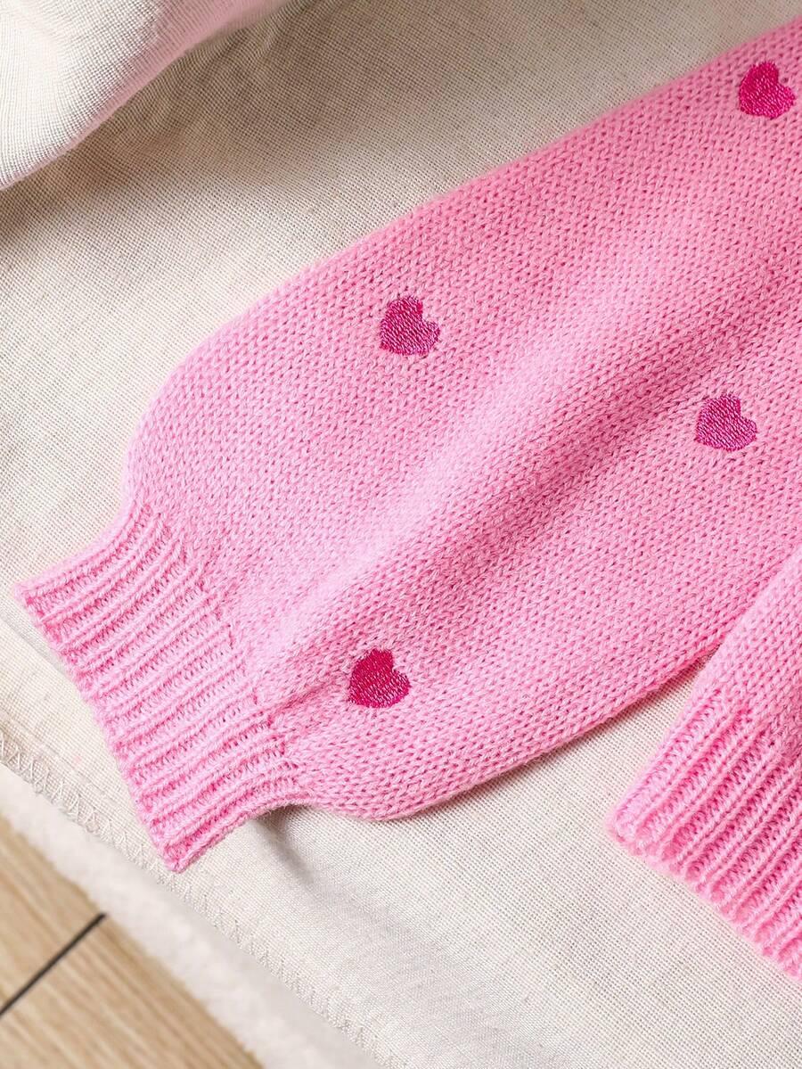 różowy sweter wiązanie