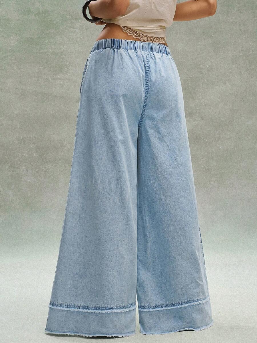 niebieskie spodnie jeans