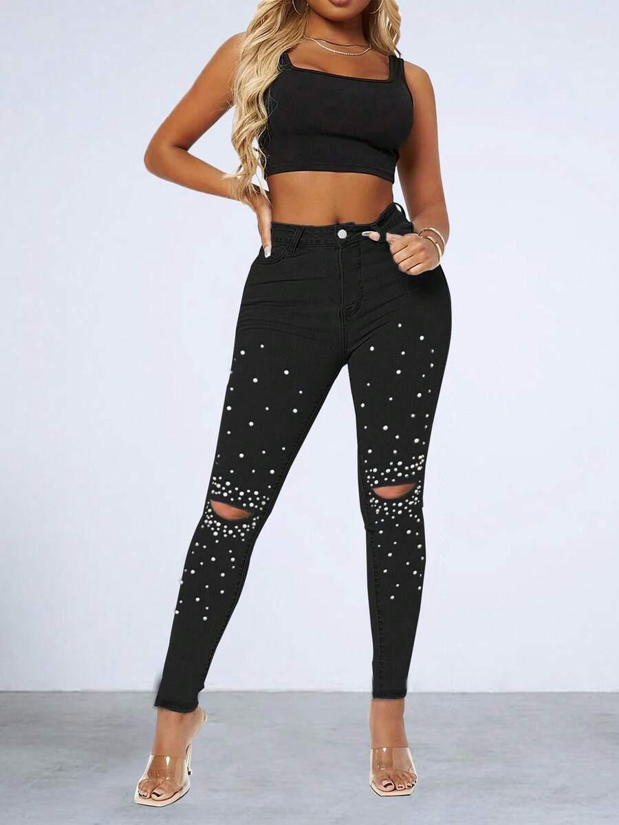 czarne spodnie jeans zdobienia 