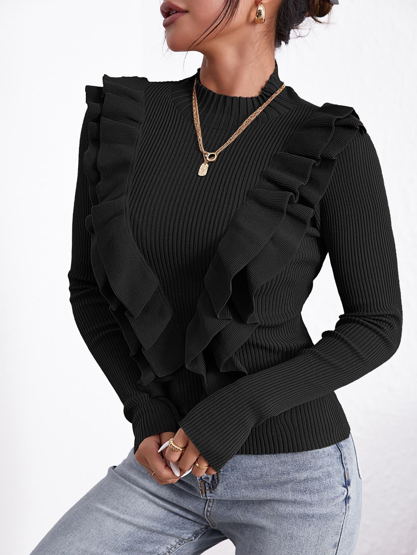 czarny sweter falbany 