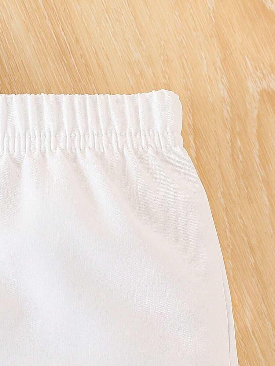 biały komplet body spodnie kamizelka