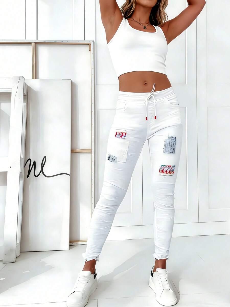 BIAŁE SPODNIE JEANS