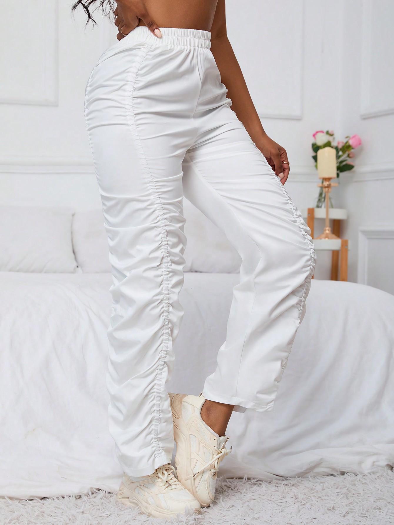 białe spodnie z gumką w pasie marszczenia high waist