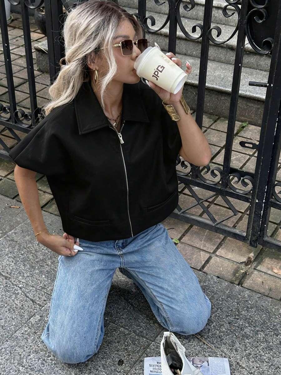 CZARNA BLUZKA ZAMEK