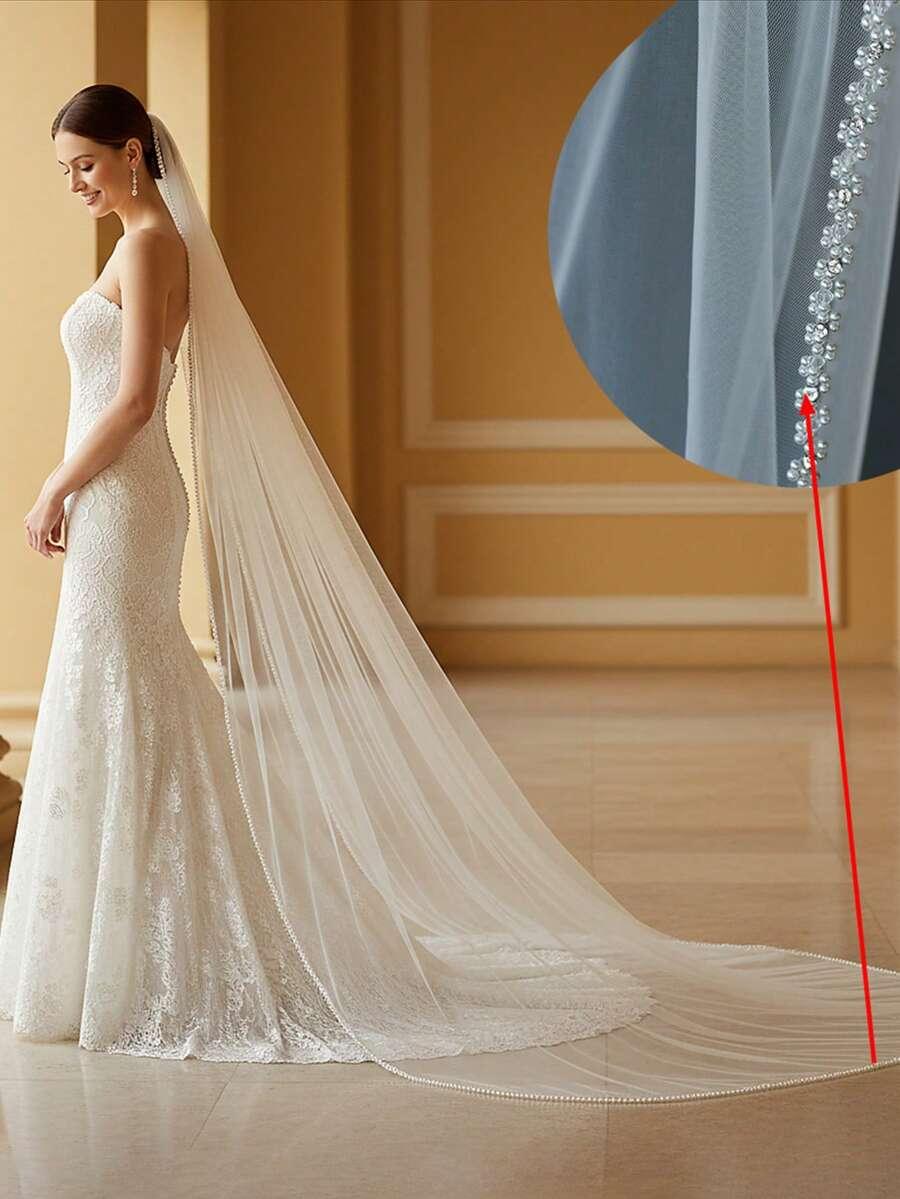 biały welon zdobienie