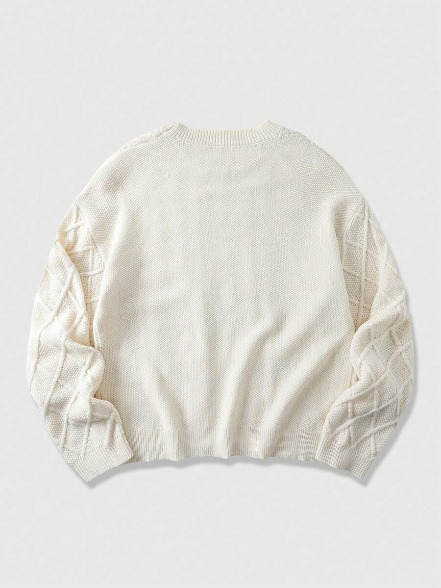 beżowy sweter nadruk