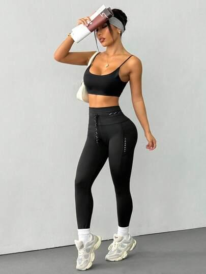 czarne legginsy sportowe