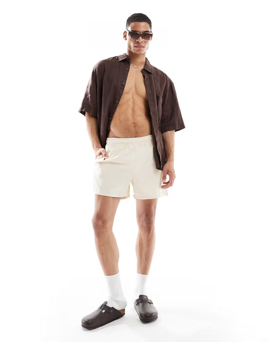 KREMOWE SPODENKI KIESZENIE