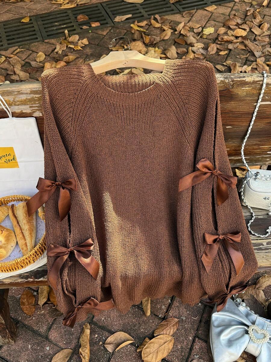 brązowy sweter kokarda