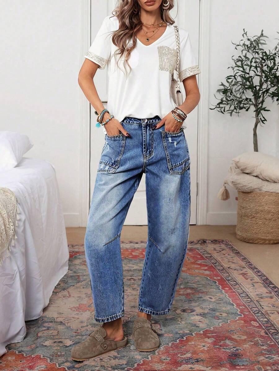 niebieskie spodnie jeans