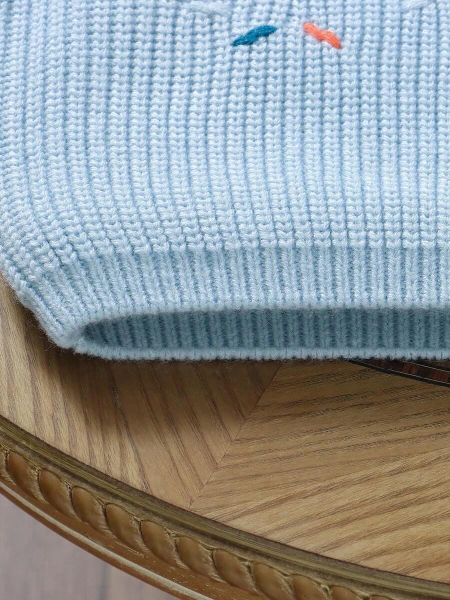 niebieski sweter haft