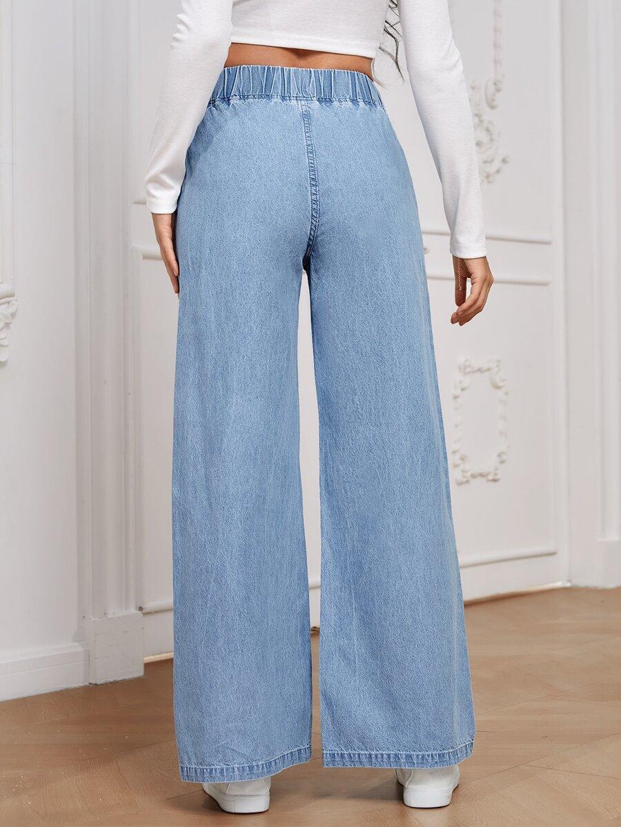 niebieskie spodnie jeans