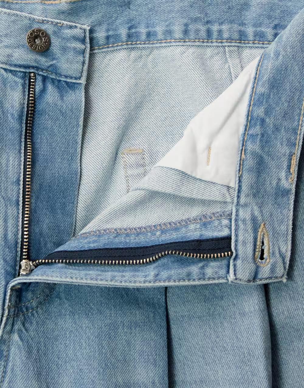 niebieskie spodnie jeans kieszenie