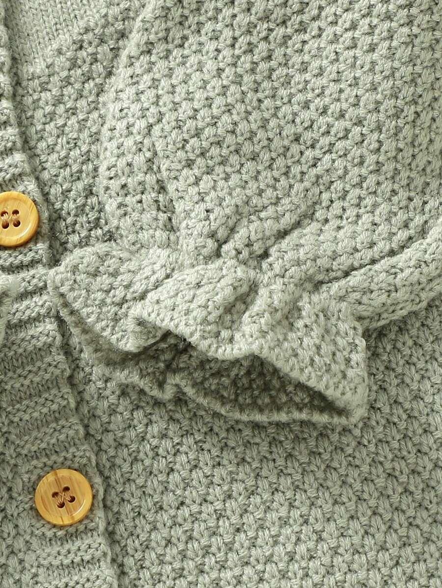 zielony niemowlęcy kombinezon kwiaty 
