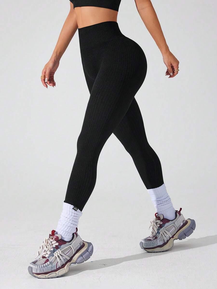czarne legginsy sportowe 