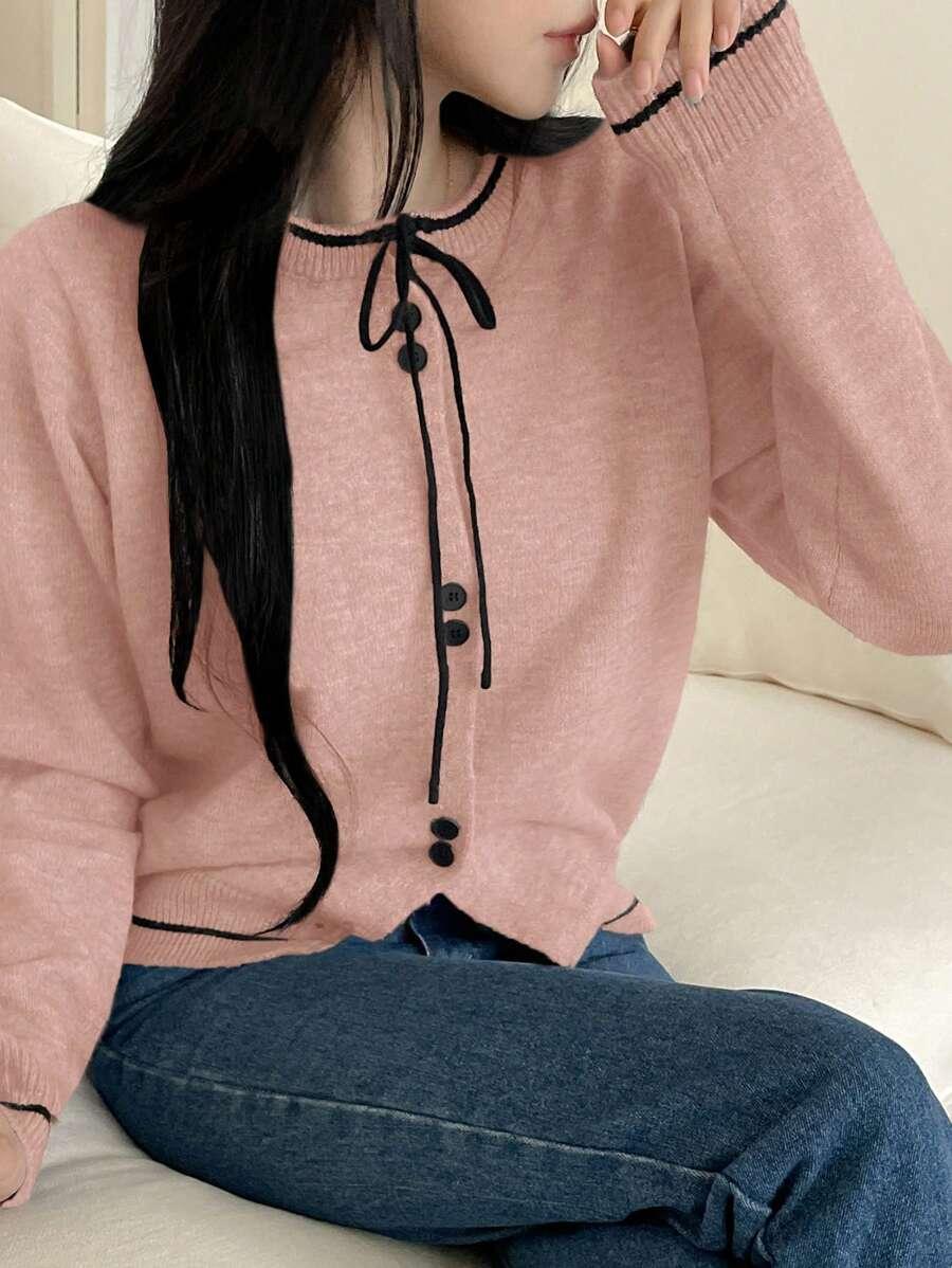 RÓŻOWY SWETER GUZIKI 