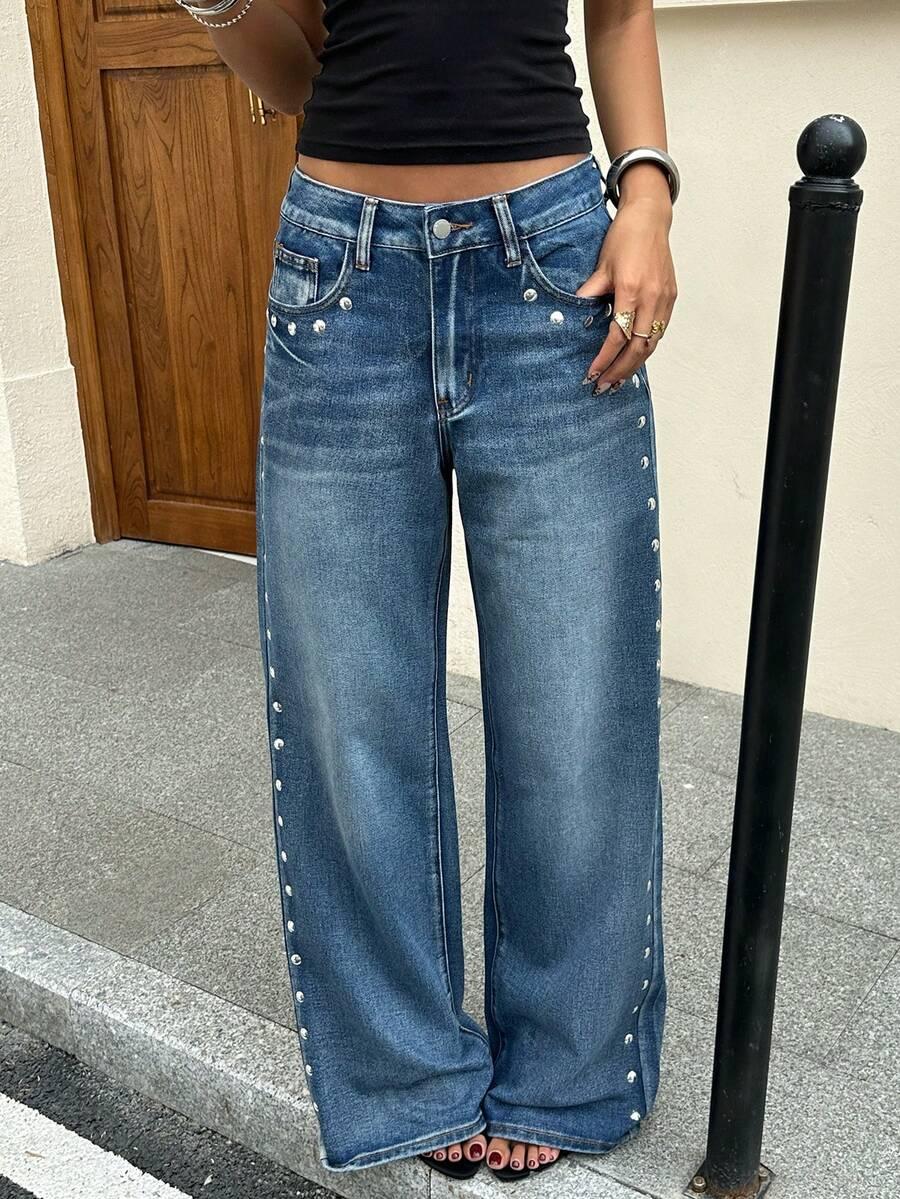 niebieskie spodnie jeans kieszenie 