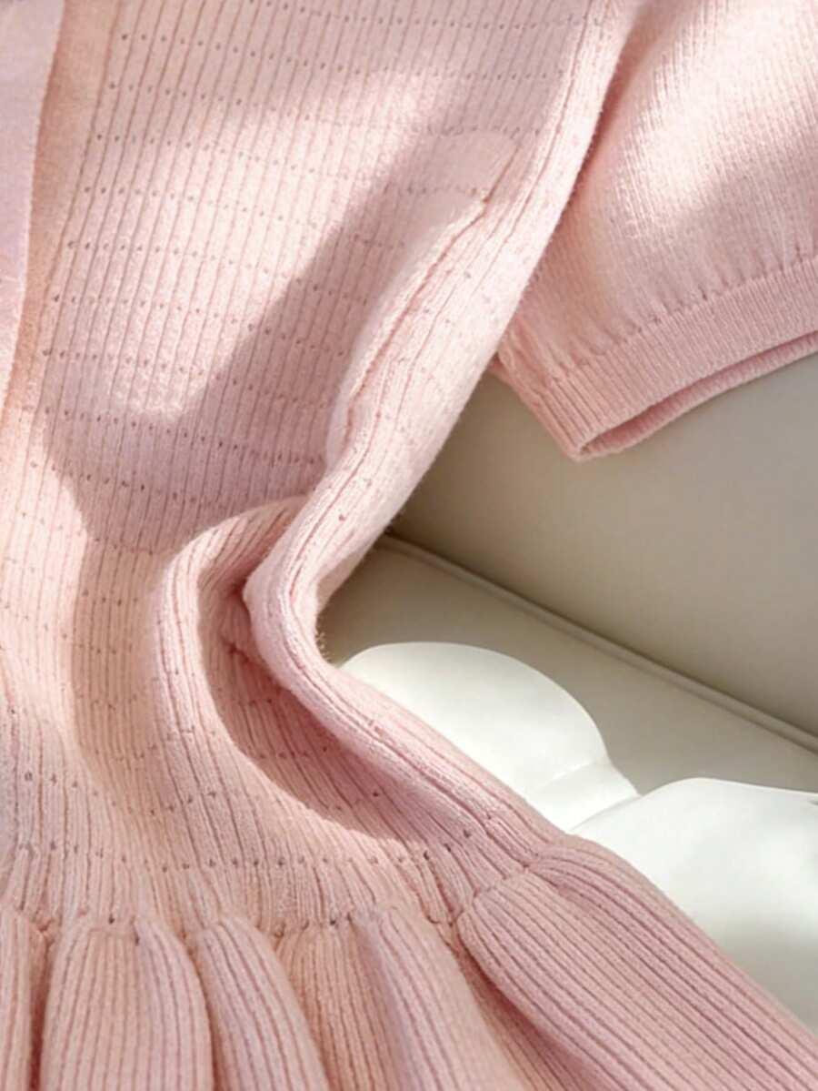 różowy dzianinowy sweter