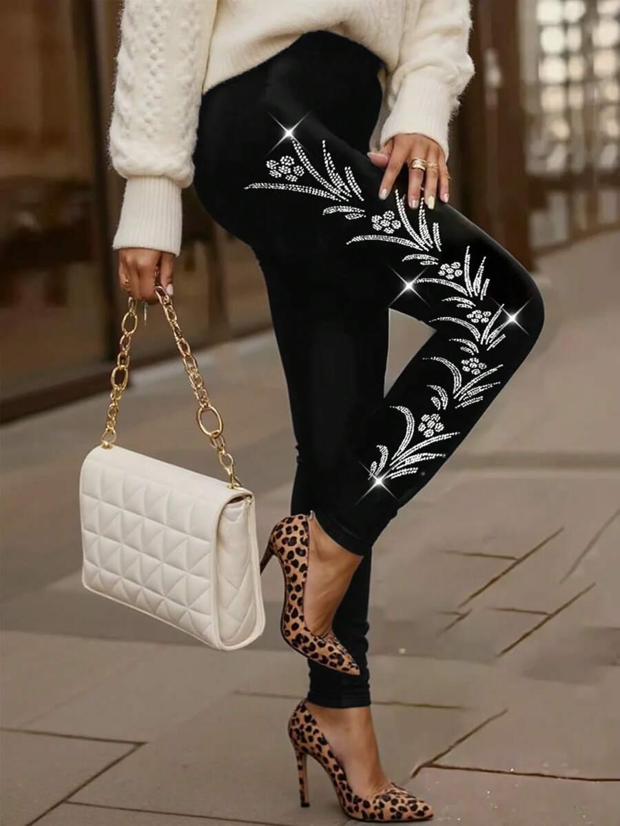 czarne legginsy nadruk