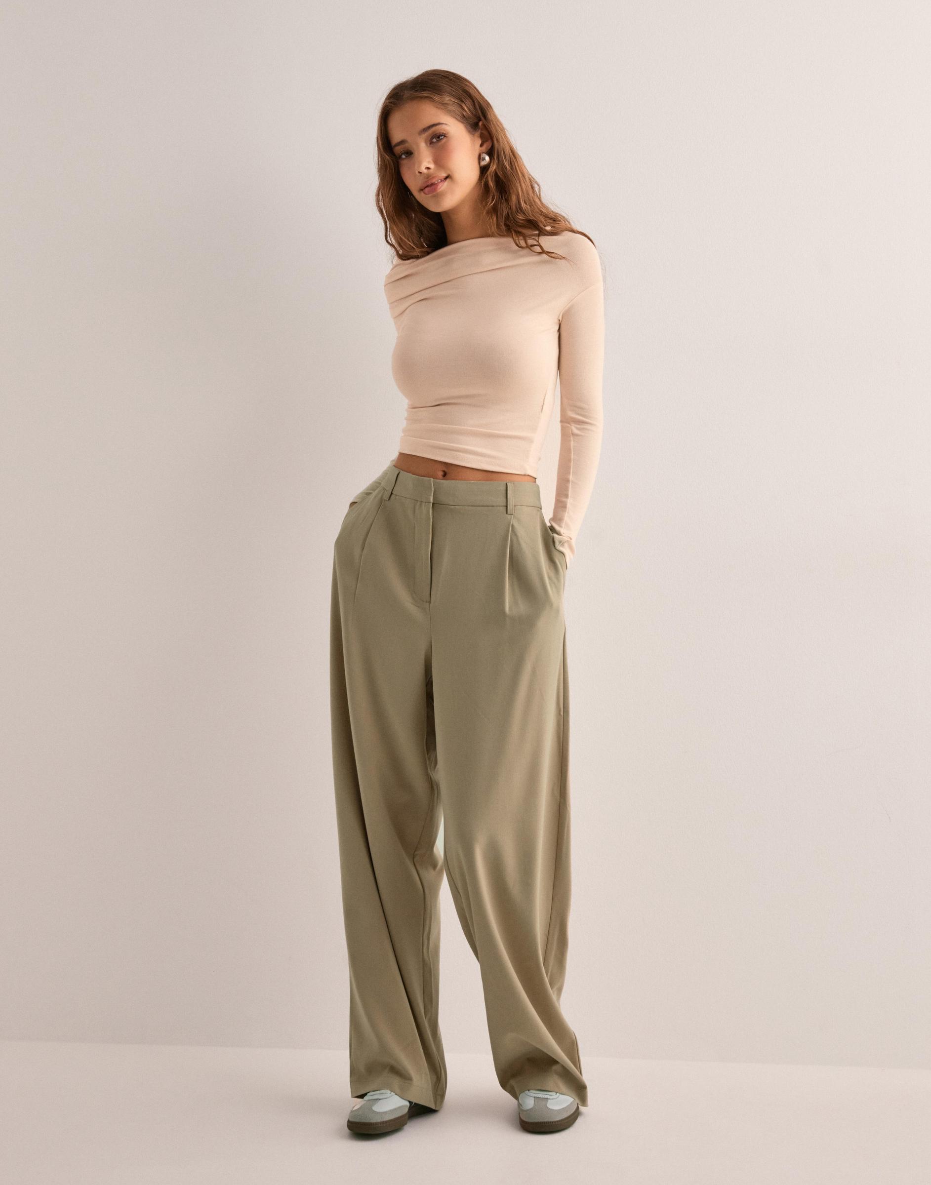 beżowe spodnie baggy kieszenie casual zamek