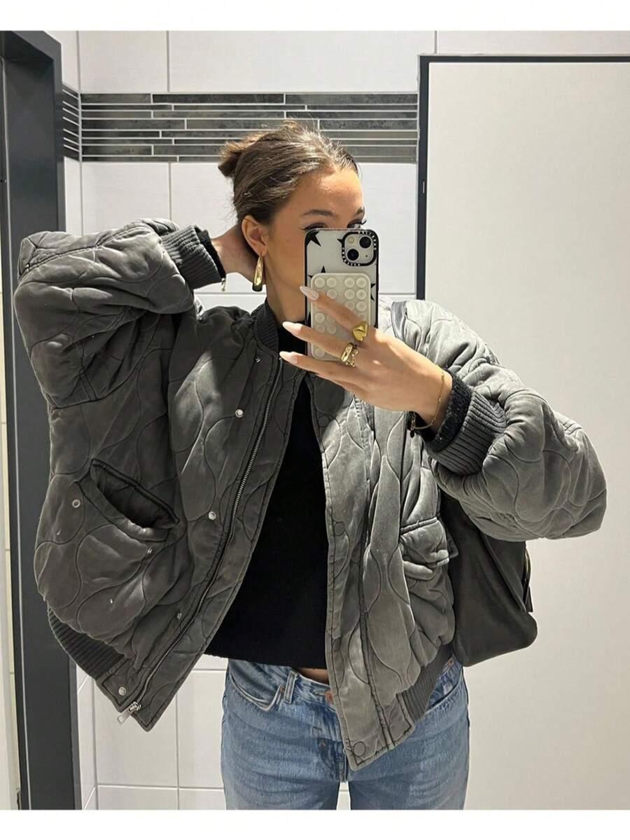 szara kurtka zamek