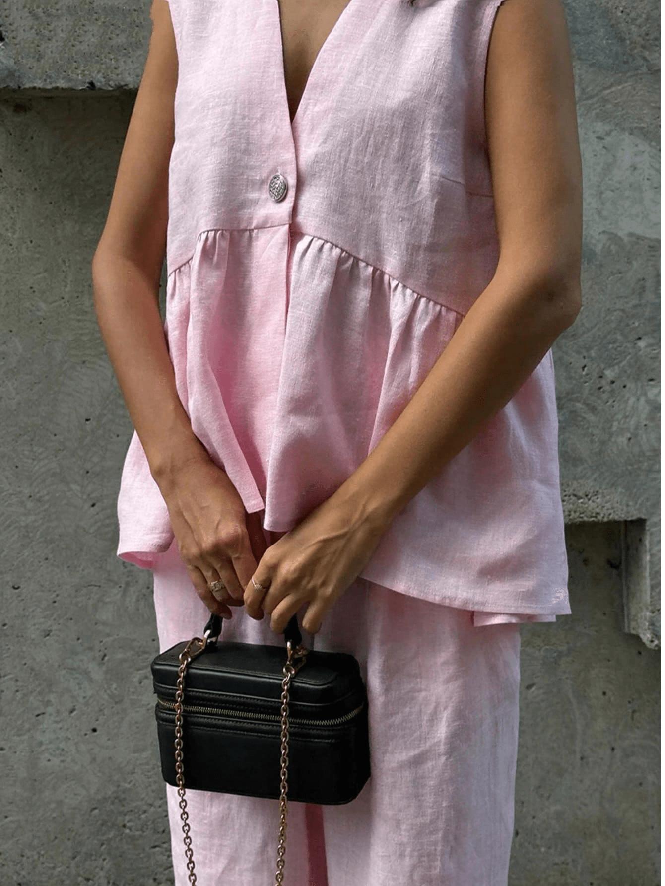 różowa bluzka bez rękawów v neck