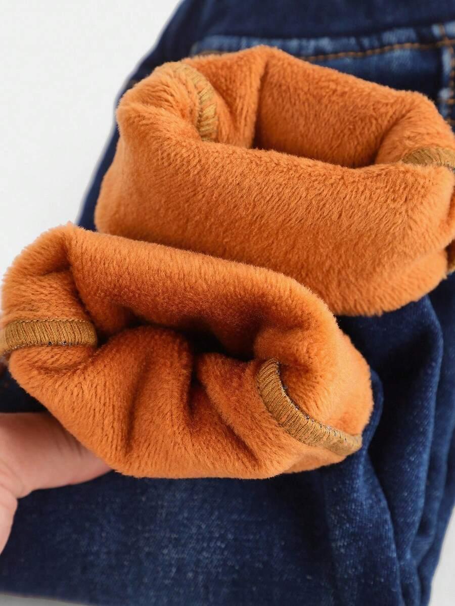 niebieskie spodnie ocieplane jeans