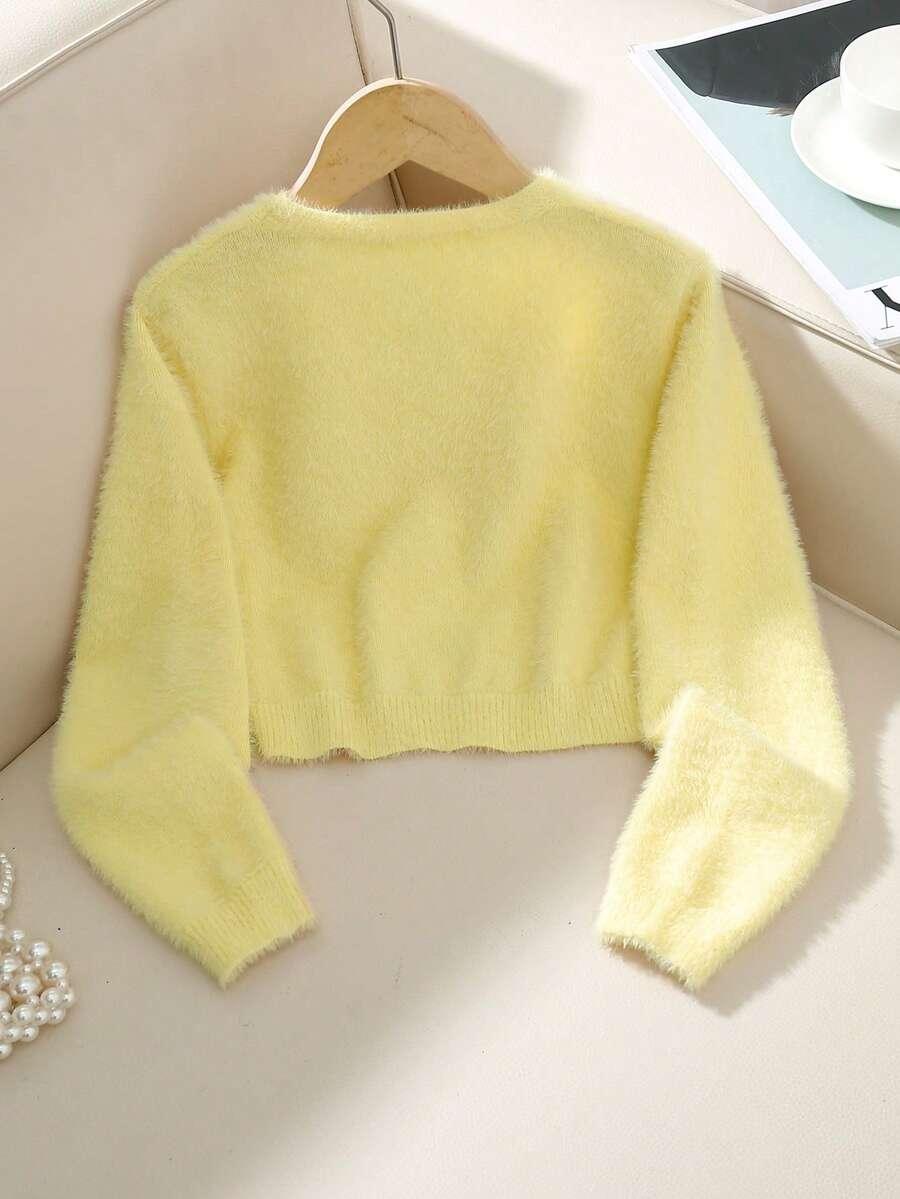 żółty sweter kardigan