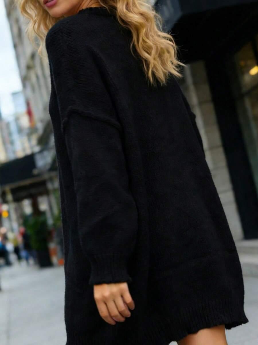 CZARNY LUŹNY SWETER