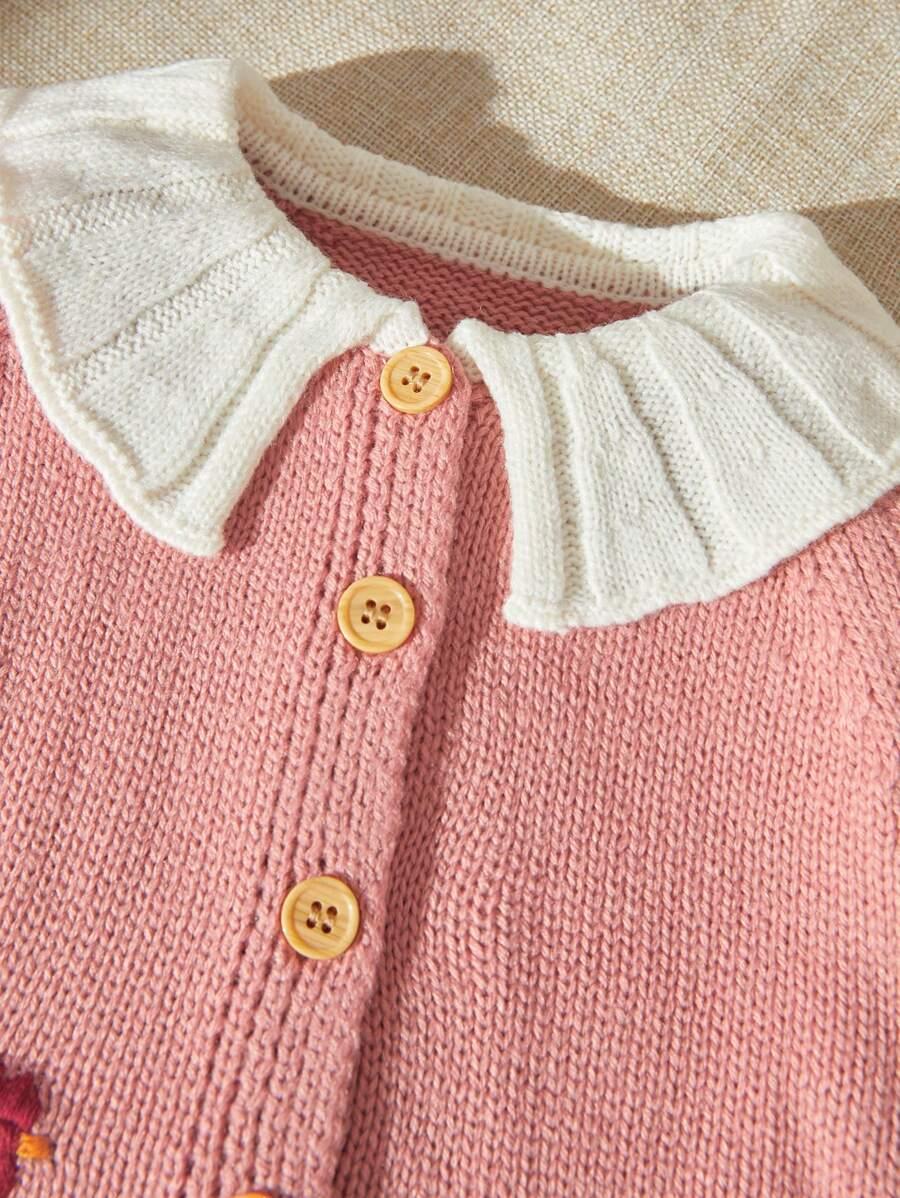 różowy sweter wzór