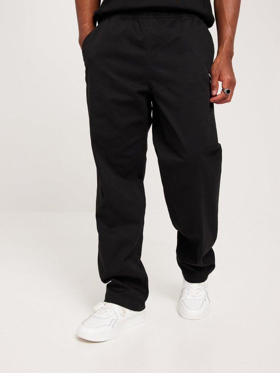 czarne spodnie casual logo wiązanie kieszenie