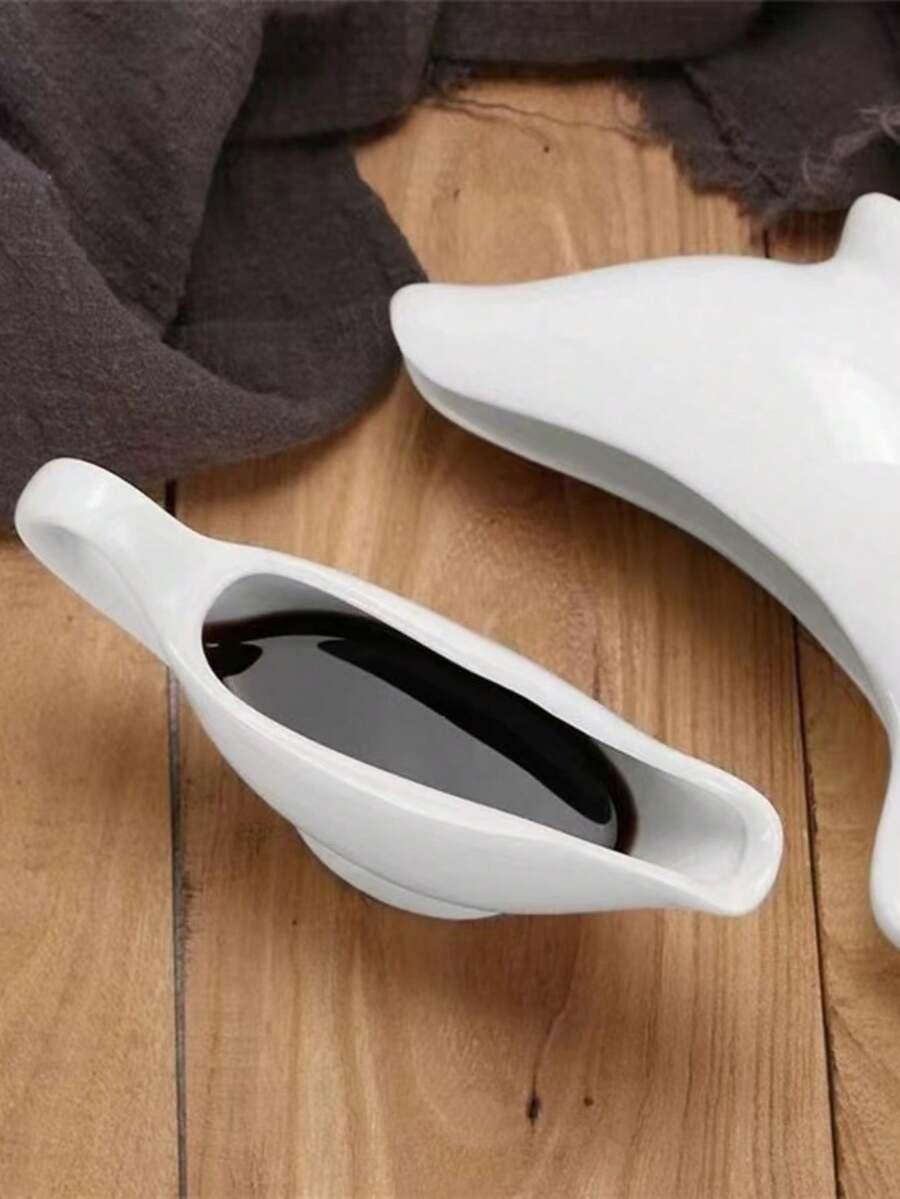 biała ceramiczna sosjerka