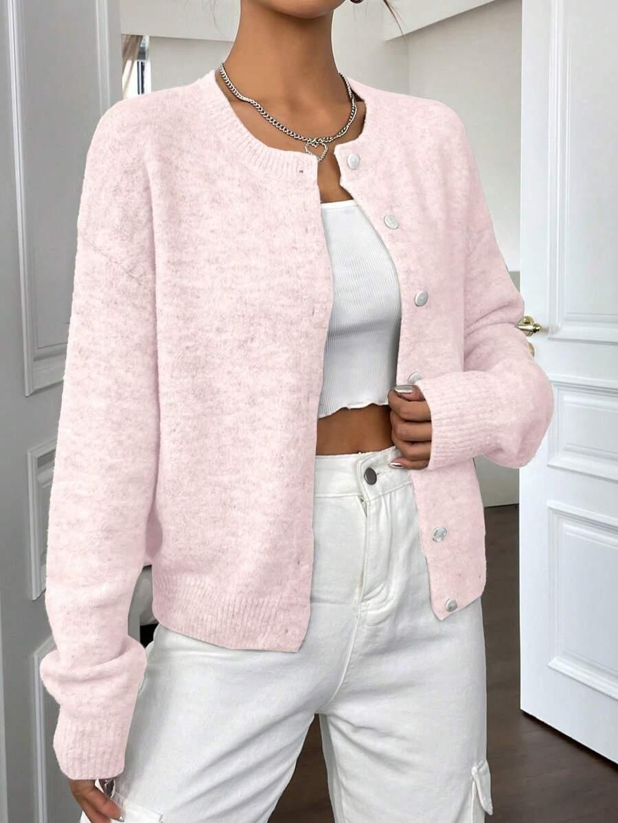 RÓŻOWY SWETER GUZIKI