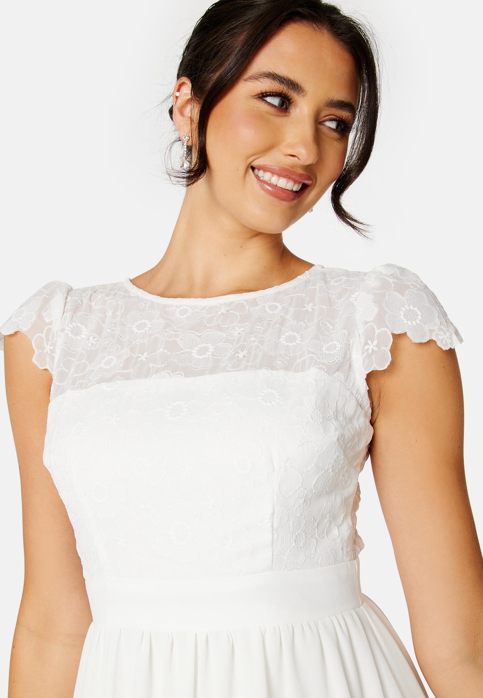 biała suknia ślubna nikolette koronka kwiaty