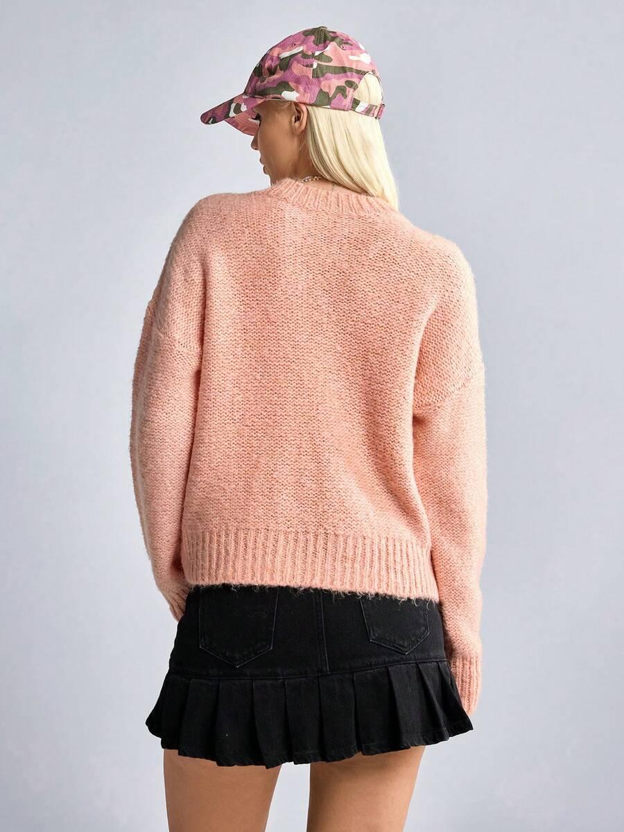 różowy sweter dzianina